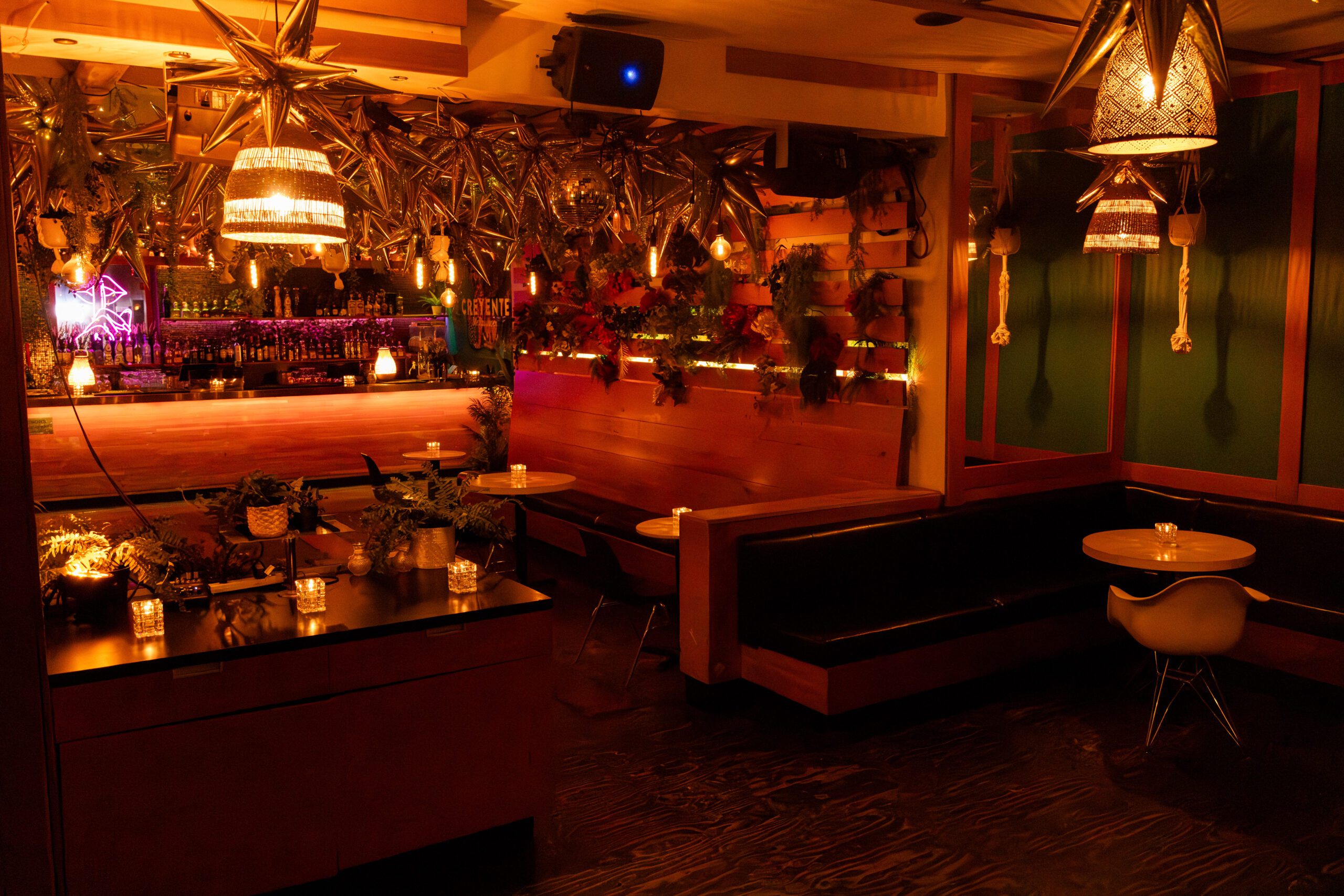 Inside The Loft, a premier event space at Pawn Shop YVR in Vancouver. Dim lighting, chic decor, and cozy seating for a memorable event.